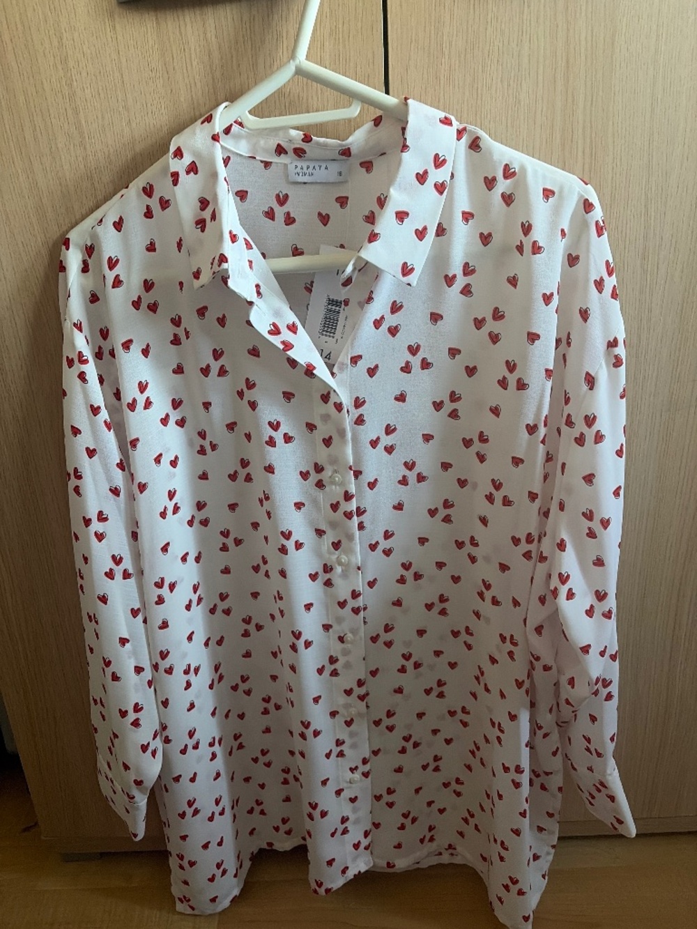 Ladies white long sleeved blouse